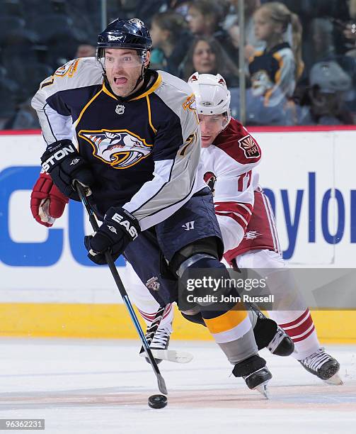 Dumont of the Nashville Predators skates away from Radim Vrbata of the Phoenix Coyotes on February 2, 2010 at the Sommet Center in Nashville,...