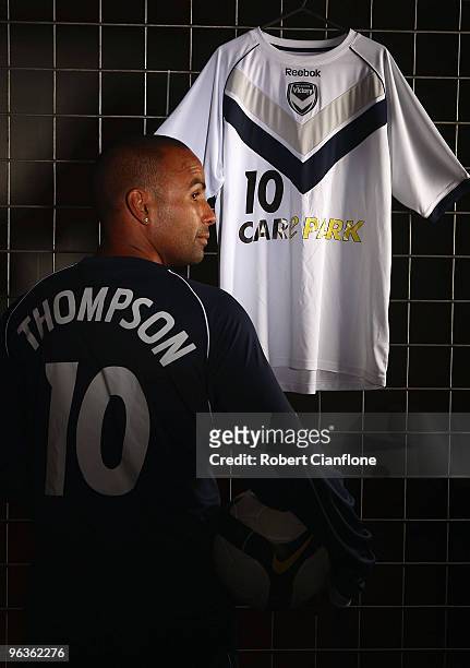 Archie Thompson of the Victory poses with the playing strip the Melbourne Victory will wear for the 2010 Asian Champions League at Etihad Stadium on...