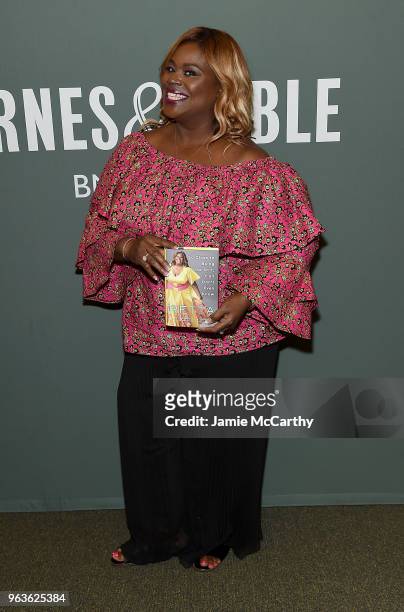 Retta signs copies of her new book "So Close To Being The Sh*T Y'all Don't Even Know" at Barnes & Noble Tribeca on May 29, 2018 in New York City.