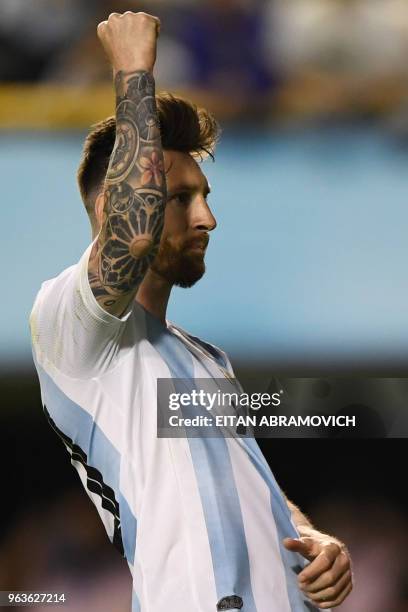 Argentina's Lionel Messi celebrates after scoring a penalty against Haiti during their international friendly football match at Boca Juniors' stadium...