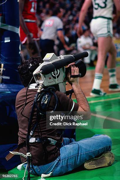 Cameraman during a Boston Celtics game played in 1981 at the Boston Garden in Boston, Massachusetts. NOTE TO USER: User expressly acknowledges and...