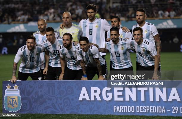 The Argentine national football team poses for pictures before the start of the international friendly football match against Haiti at Boca Juniors'...