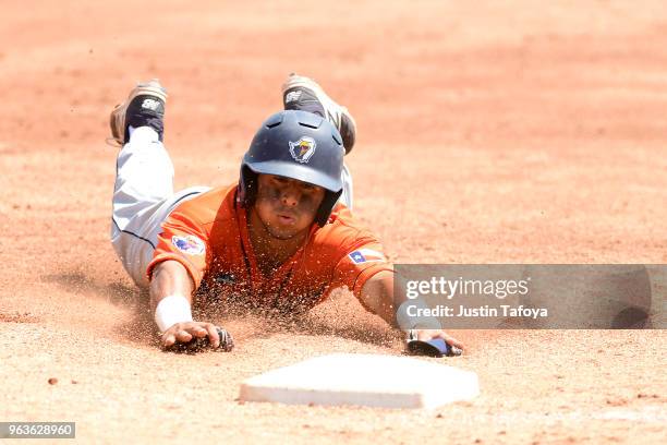 Henry Sanchez of UT Tyler slides into third base during the 2018 NCAA Photos via Getty Images Division III Baseball championship on May 29, 2018 in...