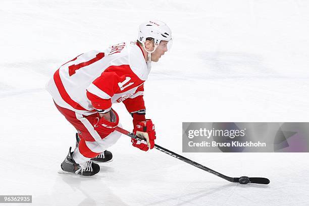 Daniel Cleary of the Detroit Red Wings skates with the puck against the Minnesota Wild during the game at the Xcel Energy Center on January 27, 2010...