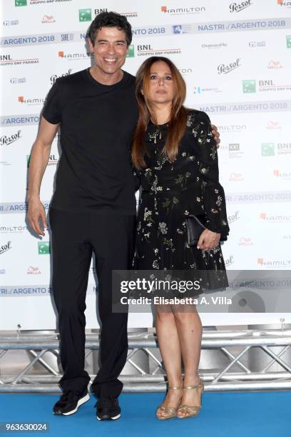 Alessandro Gassman and wife Sabrina Knaflitz attend a photocall ahead of the Nastri D'Argento nominees presentation at Maxxi Museum on May 29, 2018...