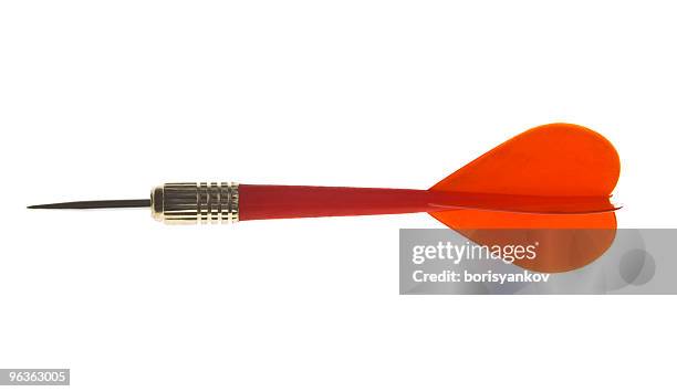 red throwing dart on white background - darts stock pictures, royalty-free photos & images