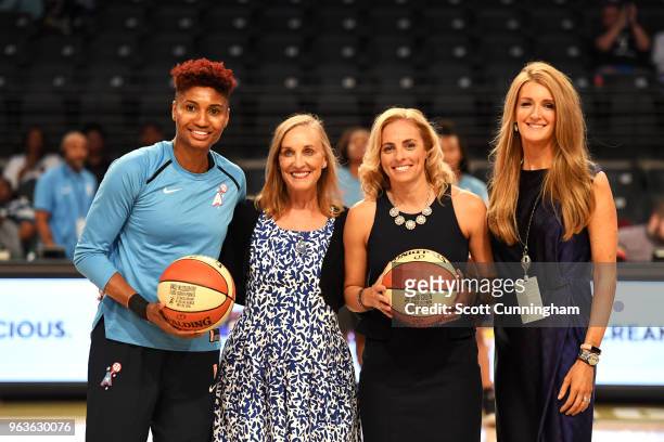 Angel McCoughtry of the Atlanta Dream is recognized for reaching 5,000 career points with Head Coach Nicki Collen and Mary Brock and Kelly Loeffler,...