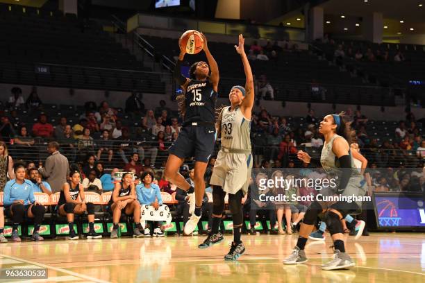 Tiffany Hayes of the Atlanta Dream shoots the balll against Seimone Augustus of the Minnesota Lynx on May 29, 2018 at McCamish Pavilion in Atlanta,...