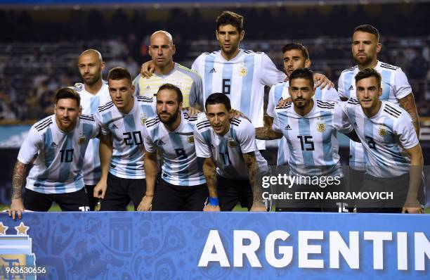 The Argentine national football team poses for pictures before the start of the international friendly football match against Haiti at Boca Juniors'...