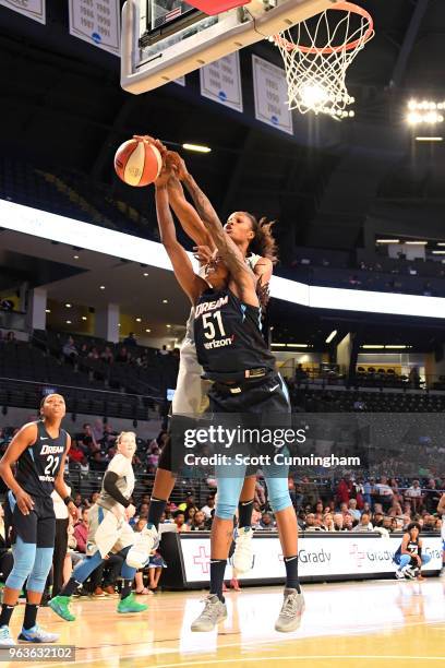Rebekkah Brunson of the Minnesota Lynx blocks as Jessica Breland of the Atlanta Dream goes to the basket on May 29, 2018 at McCamish Pavilion in...