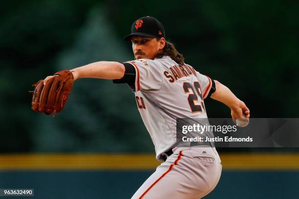 Starting pitcher Jeff Samardzija of the San Francisco Giants delivers to home plate during the first inning against the Colorado Rockies at Coors...