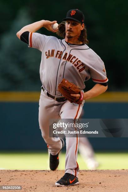 Starting pitcher Jeff Samardzija of the San Francisco Giants delivers to home plate during the first inning against the Colorado Rockies at Coors...