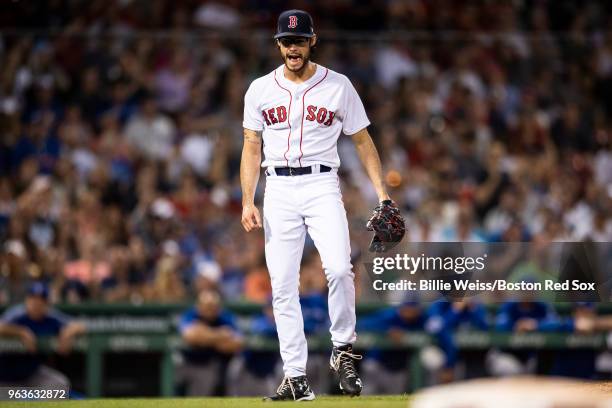 Joe Kelly of the Boston Red Sox reacts during the seventh inning of a game against the Toronto Blue Jays on May 29, 2018 at Fenway Park in Boston,...