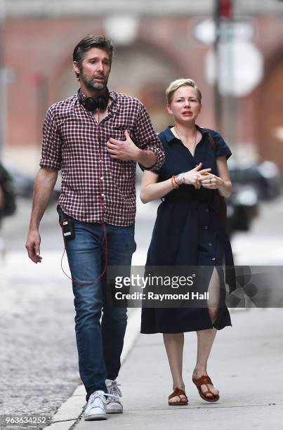 Bart Freundlich and Michelle Williams are seen on the set of After The Wedding on May 29, 2018 in New York City.