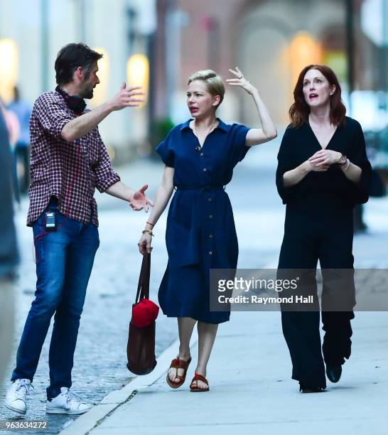 Bart Freundlich, Julianne Moore, and Michelle Williams are seen on the set of After The Wedding on May 29, 2018 in New York City.