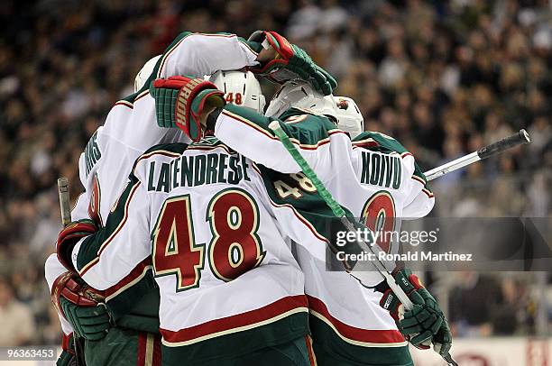 Guillaume Latendresse of the Minnesota Wild celebrates his goal against the Dallas Stars in the second period at American Airlines Center on February...