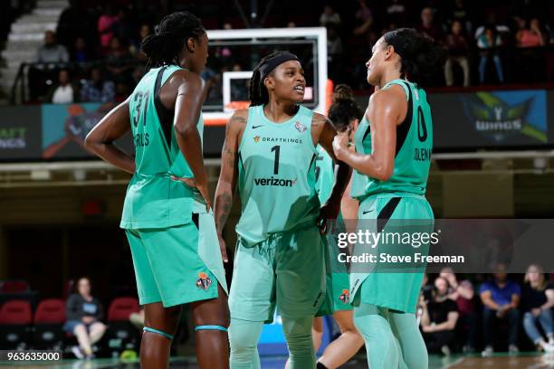 Shavonte Zellous talks to Tina Charles and Marissa Coleman of the New York Liberty during the game against the Dallas Wings on May 29, 2018 at...