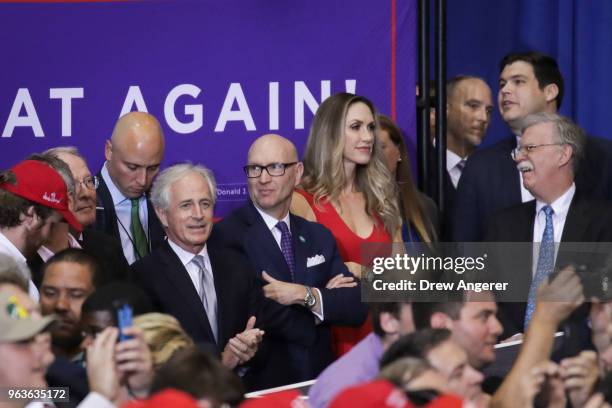 Sen. Bob Corker listens as U.S. President Donald Trump speaks during a rally at the Nashville Municipal Auditorium, May 29, 2018 in Nashville,...