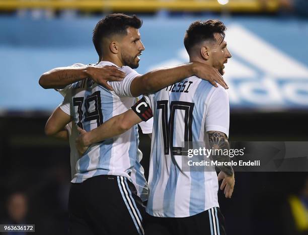 Sergio Aguero of Argentina celebrates with teammates after scoring the fourth goal of his team during an international friendly match between...