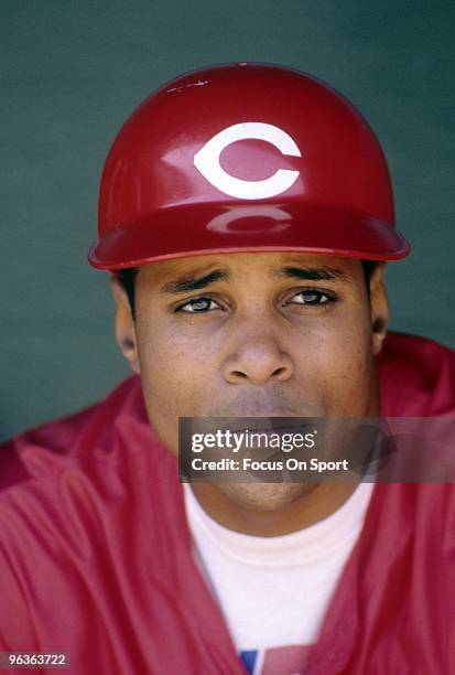S: Shortstop Barry Larkin of the Cincinnati Reds sitting in the dougout during batting practice prior to the start of a MLB baseball game against the...