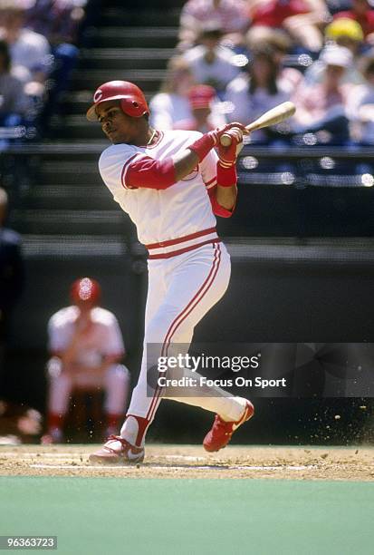 S: Shortstop Barry Larkin of the Cincinnati Reds swings and fouls the pitch off during a MLB baseball game circa 1980's at Riverfront Stadium in...