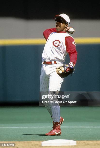 S: Shortstop Barry Larkin of the Cincinnati Reds in action during a MLB baseball game circa 1990's at Riverfront Stadium in Cincinnati, Ohio. Larkin...