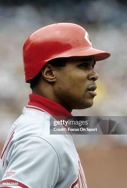 S: Shortstop Barry Larkin of the Cincinnati Reds standing in the on deck circle, waiting his turn to hit against the San Francisco Giants during a...