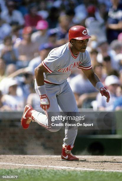 S: Shortstop Barry Larkin of the Cincinnati Reds hustles out of the batters box after putting the ball in play against the Chicago Cubs during a...