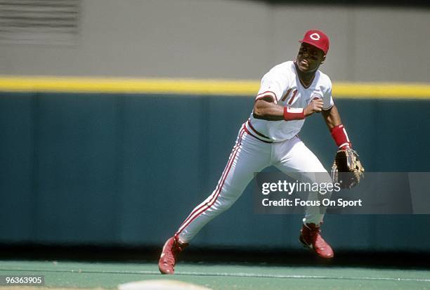 S: Shortstop Barry Larkin of the Cincinnati Reds in action making a play on the ball up the middle during a MLB baseball game circa 1990's at...