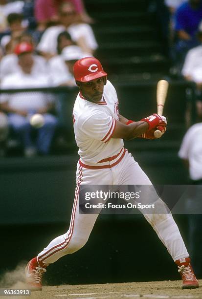 S: Shortstop Barry Larkin of the Cincinnati Reds swings and fouls a pitch off his bat during a MLB baseball game circa 1990's at Riverfront Stadium...