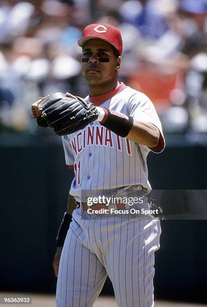 S: Shortstop Barry Larkin of the Cincinnati Reds warming up prior to the start of a MLB baseball game against the San Francisco Giants circa 1990's...