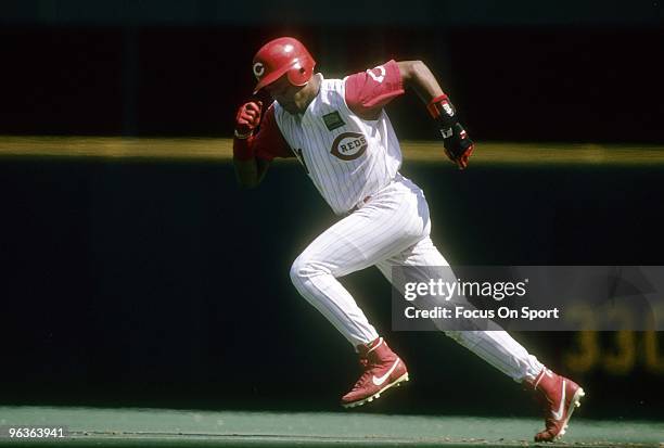 S: Shortstop Barry Larkin of the Cincinnati Reds in action attempting to steal second base during a MLB baseball game circa 1990's at Riverfront...
