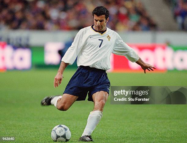 Luis Figo of Portugal on the ball during the International Friendly match between France and Portugal played at the Stade de France in Paris, France....