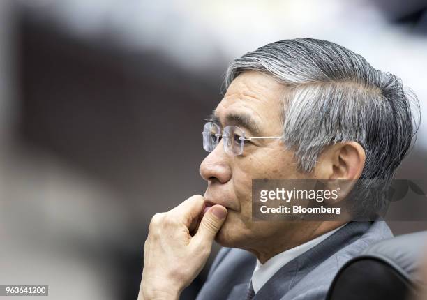 Haruhiko Kuroda, governor of the Bank of Japan , attends a conference hosted by the BOJ and the Institute for Monetary and Economic Studies in Tokyo,...