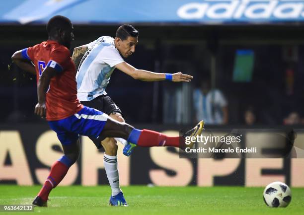 Angel Di Maria of Argentina takes a shot during an international friendly match between Argentina and Haiti at Alberto J. Armando Stadium on May 29,...