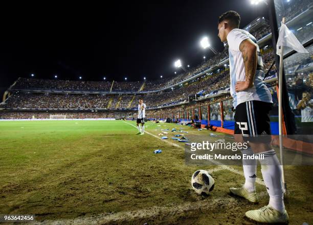 Cristian Pavon of Argentina takes a corner during an international friendly match between Argentina and Haiti at Alberto J. Armando Stadium on May...