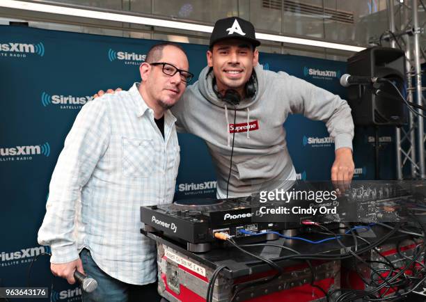 SiriusXM host Geronimo poses for a photo with DJ Afrojack before his performance at the SiriusXM Studios on May 29, 2018 in New York City.