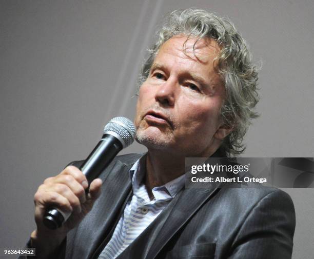 Actor John Savage answers questions during the Q & A portion of the 40th Anniversary Screening Of "The Deer Hunter" held at Ahrya Fine Arts Movie...