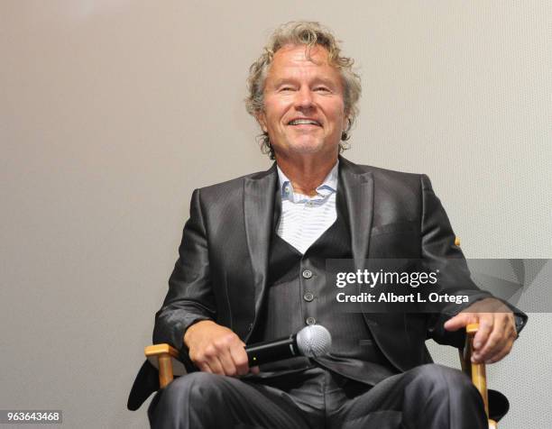 Actor John Savage answers questions during the Q & A portion of the 40th Anniversary Screening Of "The Deer Hunter" held at Ahrya Fine Arts Movie...