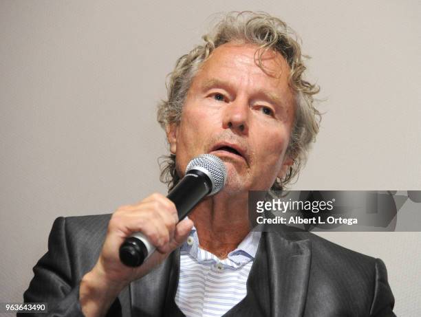 Actor John Savage answers questions during the Q & A portion of the 40th Anniversary Screening Of "The Deer Hunter" held at Ahrya Fine Arts Movie...