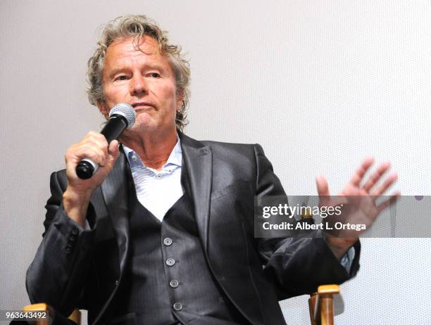 Actor John Savage answers questions during the Q & A portion of the 40th Anniversary Screening Of "The Deer Hunter" held at Ahrya Fine Arts Movie...