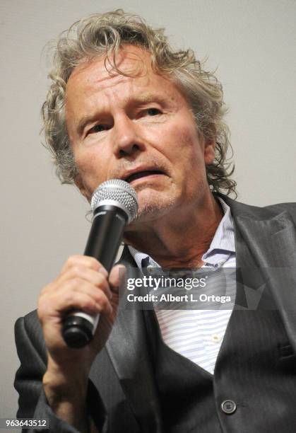 Actor John Savage answers questions during the Q & A portion of the 40th Anniversary Screening Of "The Deer Hunter" held at Ahrya Fine Arts Movie...