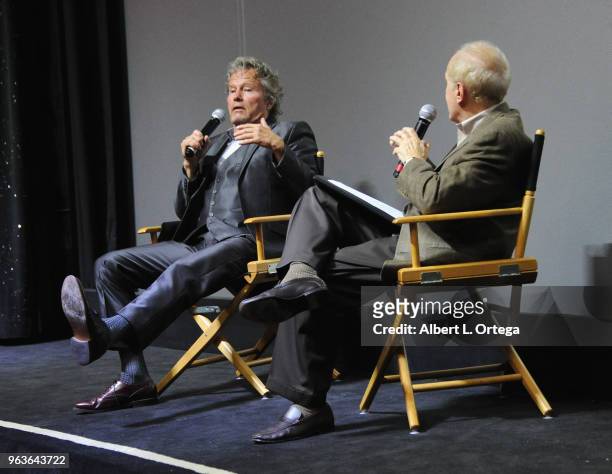 Actor John Savage answers questions from moderator Stephen Farber during the question and answer portion of the 40th Anniversary Screening Of "The...