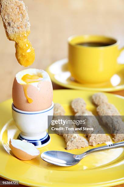 breakfast boiled egg and eggy soldiers - cooked eggs stock pictures, royalty-free photos & images