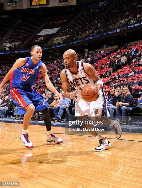 Jarvis Hayes of the New Jersey Nets drives against Tayshaun Prince of the Detroit Pistons during the game on February 2, 2010 at the Izod Center in...