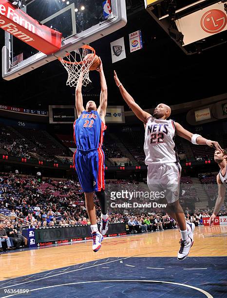 Tayshaun Prince of the Detroit Pistons shoots against Jarvis Hayes of the New Jersey Nets during the game on February 2, 2010 at the Izod Center in...