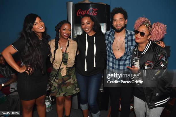 Riley Burruss, Kandi Burruss, Cynthia Bailey, Jussie Smollett, and Dabrat pose backstage during Jussie Smollett's "Sum of My Music" tour at The...