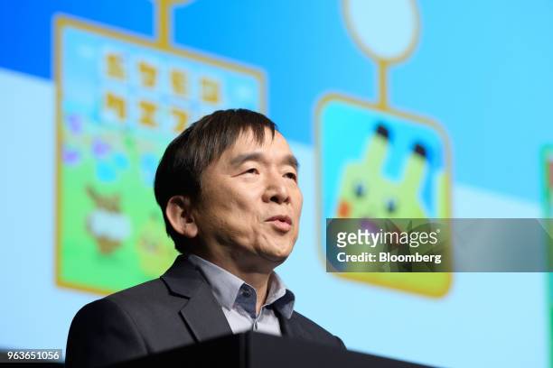 Tsunekazu Ishihara, chief executive officer of Pokemon Co., speaks during a Pokemon news conference where the company unveiled the video games...