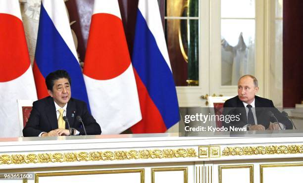 Japanese Prime Minister Shinzo Abe speaks during a joint press conference with Russian President Vladimir Putin after their talks at the Kremlin in...