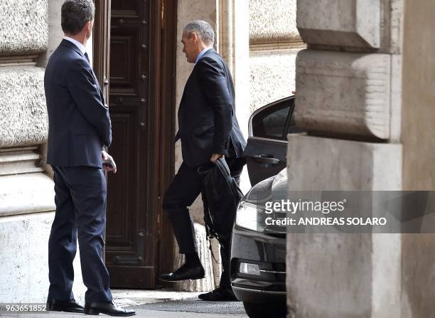 Designated Prime Minister Carlo Cottarelli arrives at the Italian Parliament after an early informal meeting with the Italian President at the...